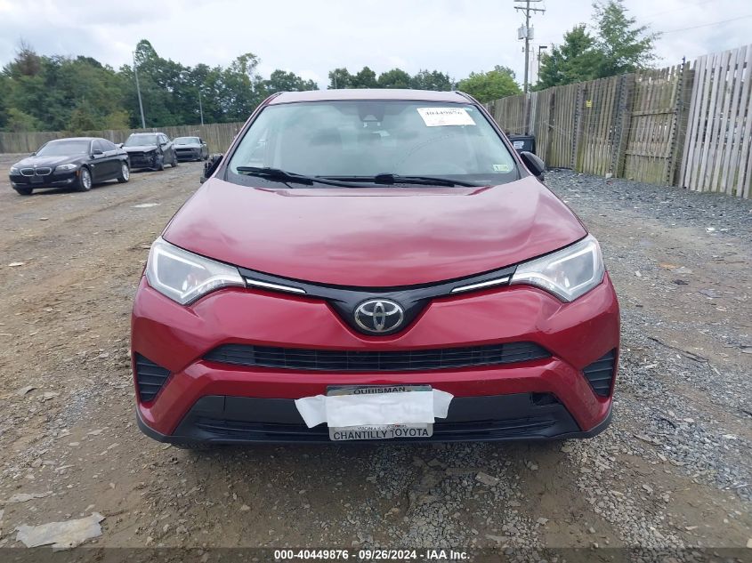 2018 Toyota Rav4 Le VIN: 2T3BFREV6JW717743 Lot: 40449876