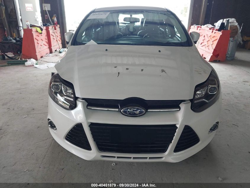 2013 Ford Focus Titanium VIN: 1FADP3N20DL290047 Lot: 40451879