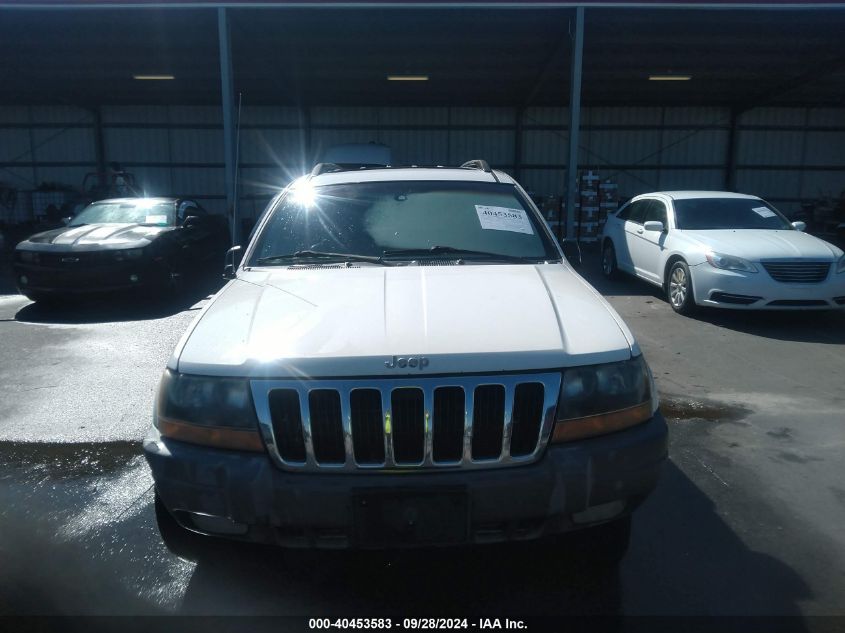 2000 Jeep Grand Cherokee Laredo VIN: 1J4GW48S0YC415513 Lot: 40453583