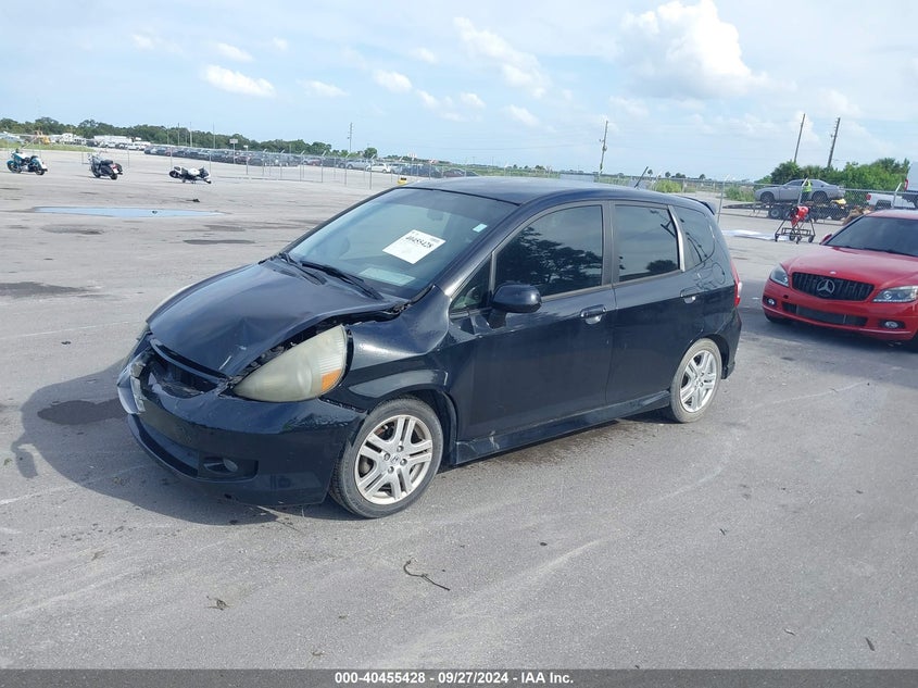2007 HONDA FIT VIN: JHMGD38637S025940