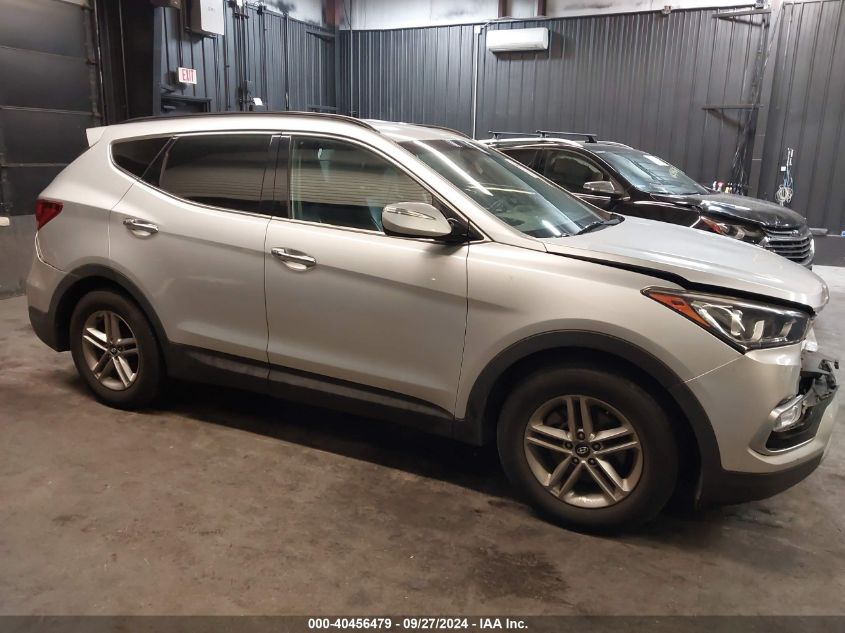 2018 Hyundai Santa Fe Sport 2.4L VIN: 5XYZUDLB3JG570618 Lot: 40456479