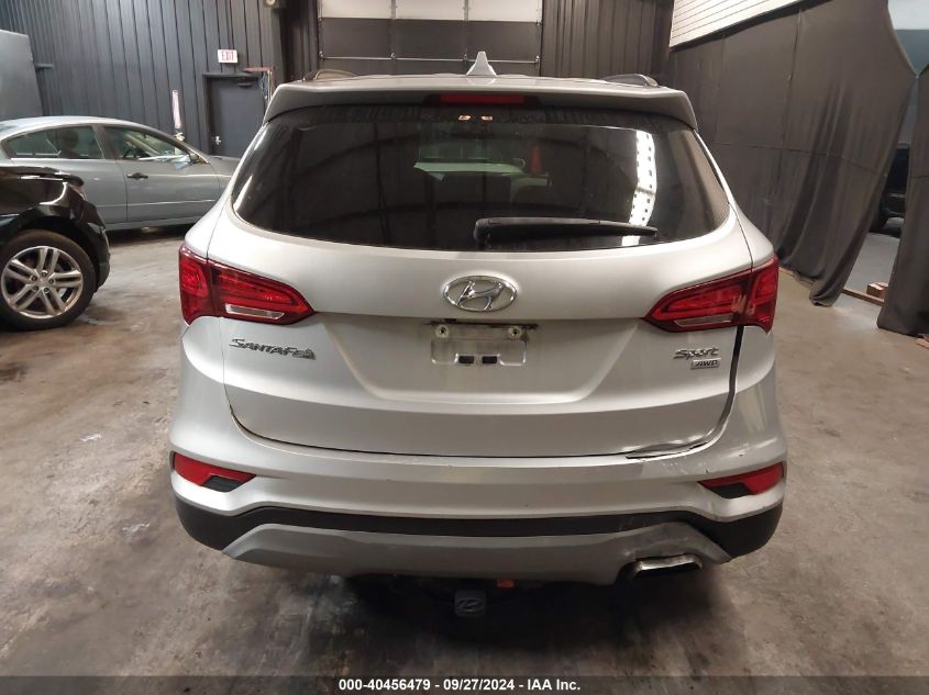 2018 Hyundai Santa Fe Sport 2.4L VIN: 5XYZUDLB3JG570618 Lot: 40456479