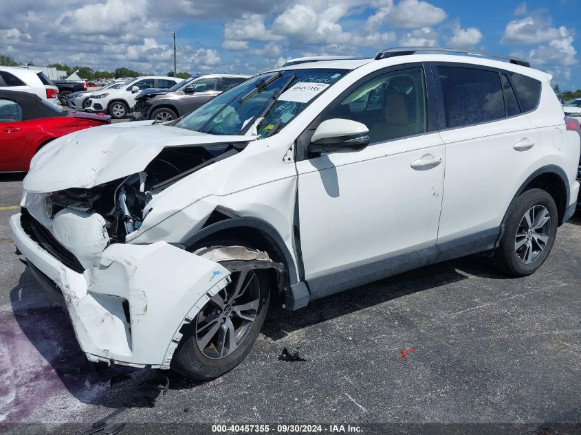 2017 Toyota Rav4 Xle VIN: JTMWFREV9HD104668 Lot: 40457355