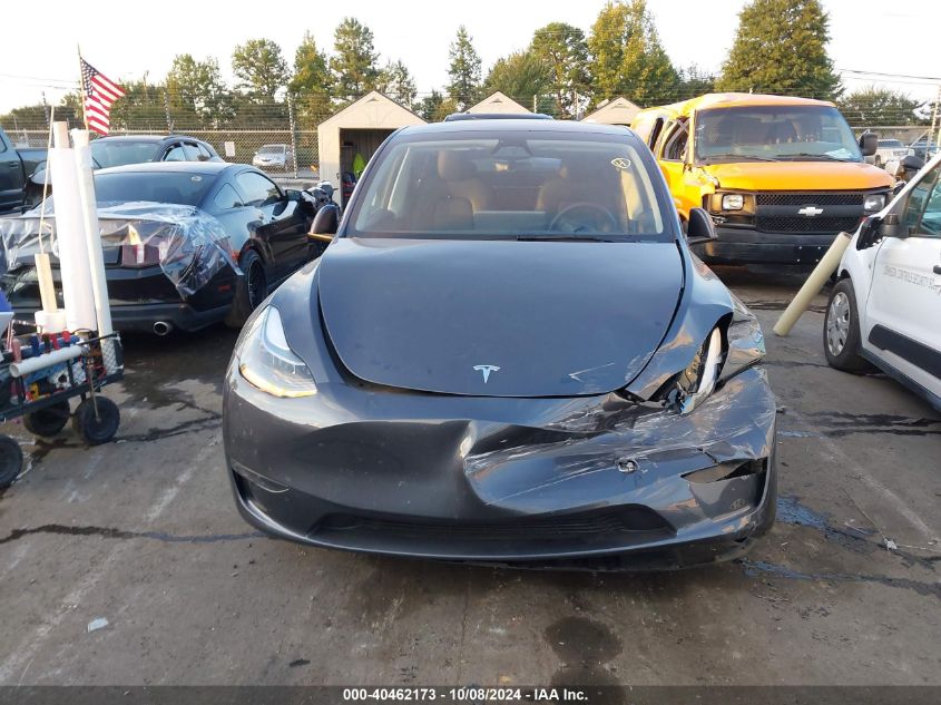 2023 Tesla Model Y Awd/Long Range Dual Motor All-Wheel Drive VIN: 7SAYGDEE4PA170738 Lot: 40462173