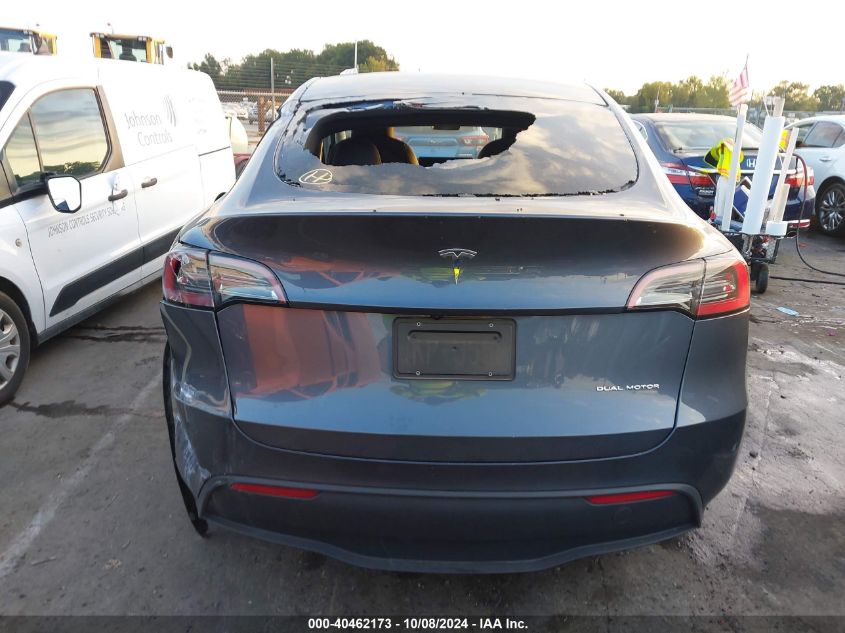 2023 Tesla Model Y Awd/Long Range Dual Motor All-Wheel Drive VIN: 7SAYGDEE4PA170738 Lot: 40462173