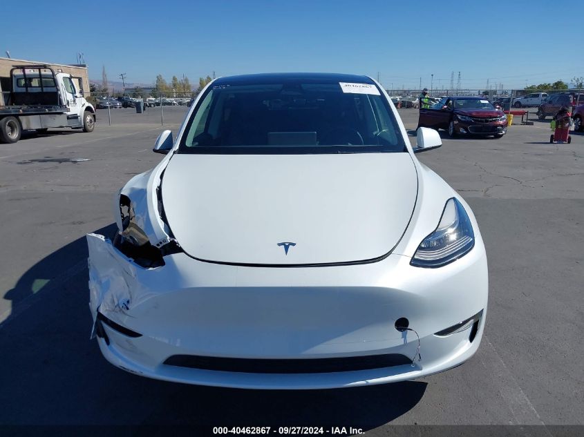 2023 Tesla Model Y Awd/Long Range Dual Motor All-Wheel Drive VIN: 7SAYGDEE8PF634374 Lot: 40462867