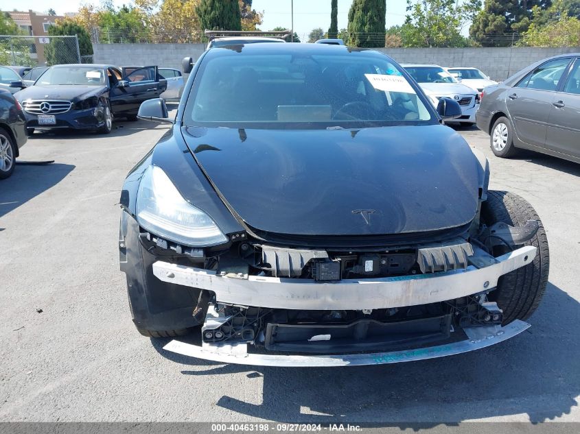 2018 Tesla Model 3 Long Range/Mid Range VIN: 5YJ3E1EA4JF010698 Lot: 40463198