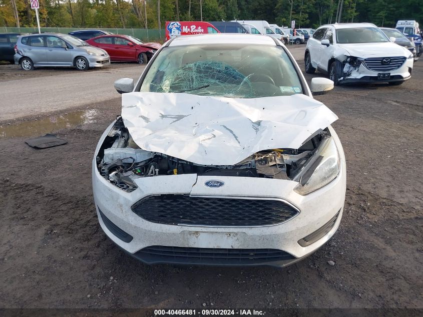 2015 Ford Focus Se VIN: 1FADP3F20FL260242 Lot: 40466481