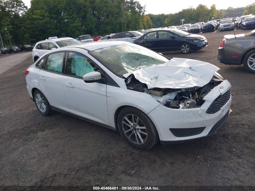 VIN 1FADP3F20FL260242 2015 FORD FOCUS no.1