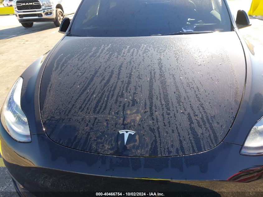 2023 Tesla Model Y VIN: 7SAYGDEF9PF834236 Lot: 40466754