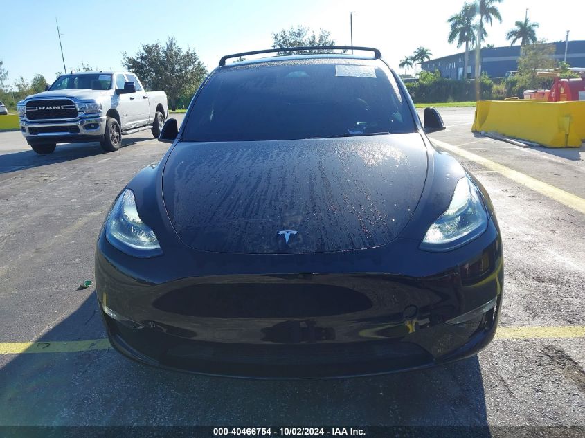 2023 Tesla Model Y VIN: 7SAYGDEF9PF834236 Lot: 40466754