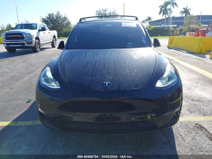 2023 Tesla Model Y VIN: 7SAYGDEF9PF834236 Lot: 40466754