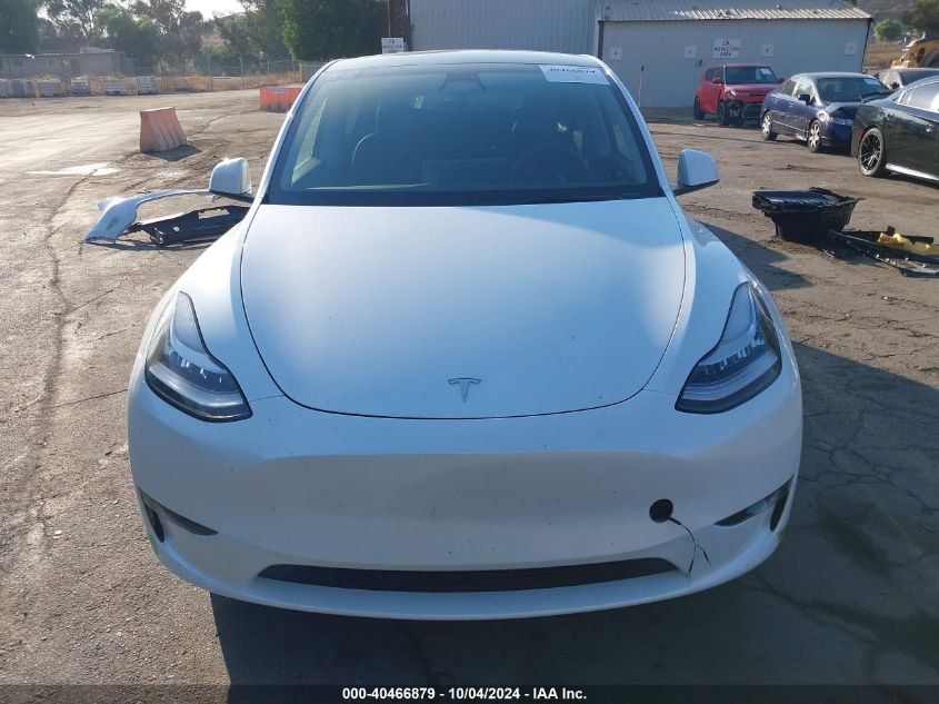 2023 Tesla Model Y Awd/Long Range Dual Motor All-Wheel Drive VIN: 7SAYGDEE4PA069599 Lot: 40466879