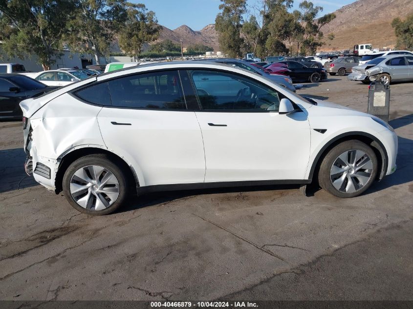 2023 Tesla Model Y Awd/Long Range Dual Motor All-Wheel Drive VIN: 7SAYGDEE4PA069599 Lot: 40466879