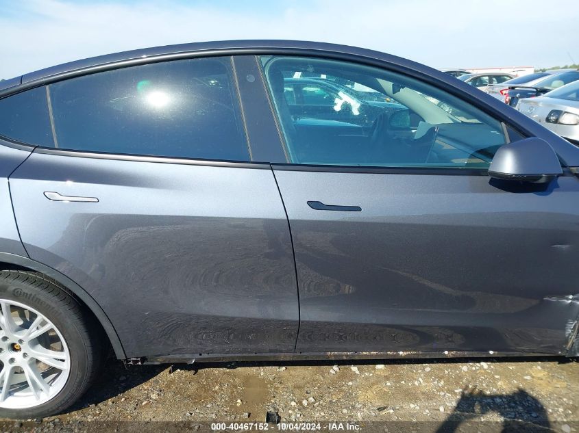 2023 Tesla Model Y Awd/Long Range Dual Motor All-Wheel Drive VIN: 7SAYGDEEXPF770974 Lot: 40467152