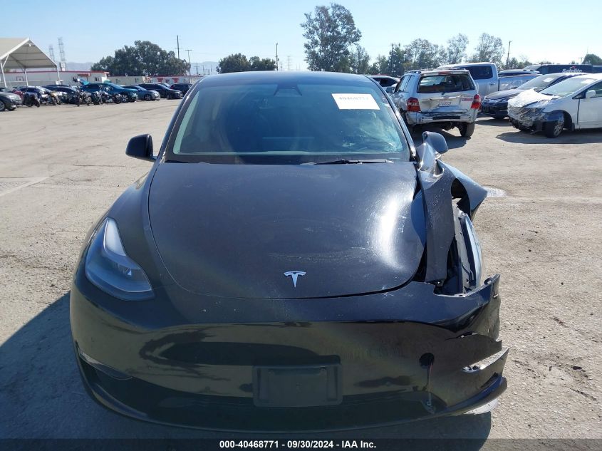 2022 Tesla Model Y VIN: 7SAYGDEF7NF392621 Lot: 40468771