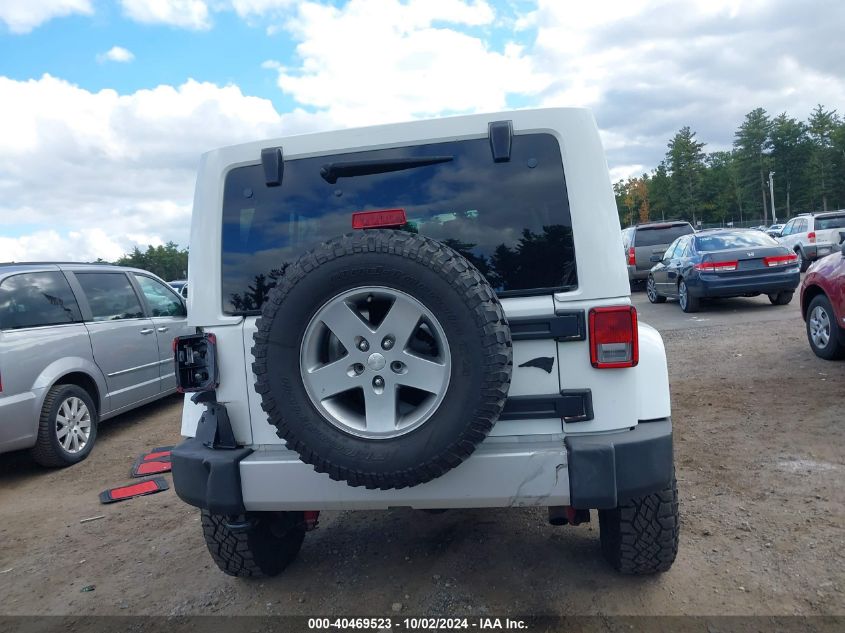 2013 Jeep Wrangler Unlimited Sahara VIN: 1C4BJWEG0DL698984 Lot: 40469523