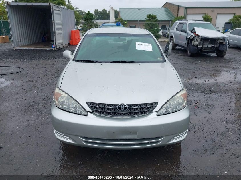 2004 Toyota Camry Le VIN: 4T1BE32KX4U801006 Lot: 40470295