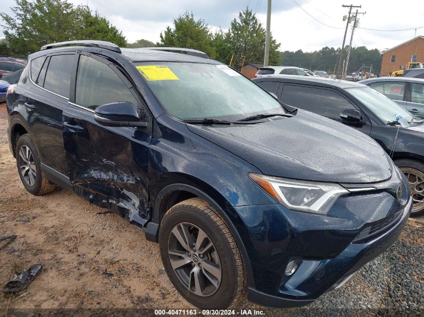 VIN JTMWFREV9JJ729854 2018 Toyota RAV4, Xle no.1