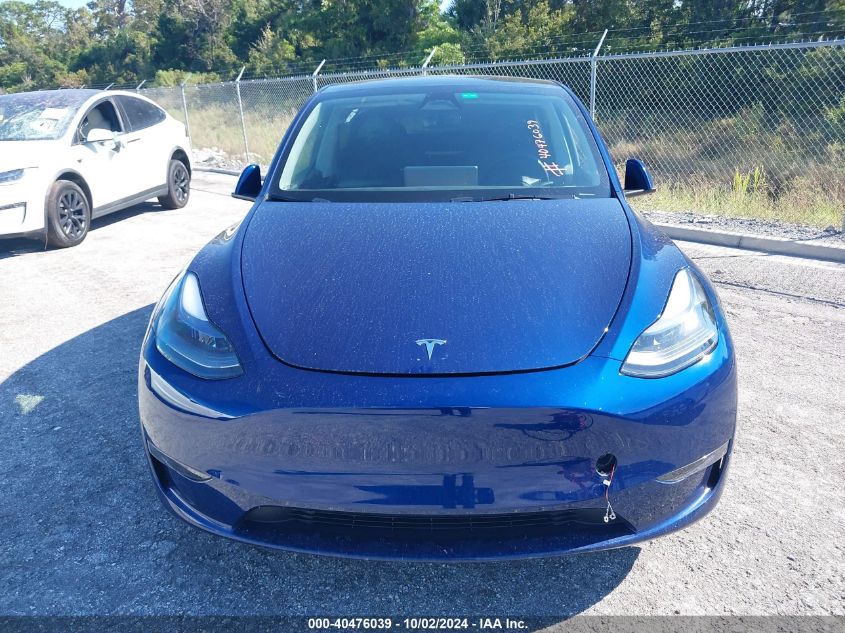 2023 Tesla Model Y VIN: 7SAYGDEF9PF911820 Lot: 40476039