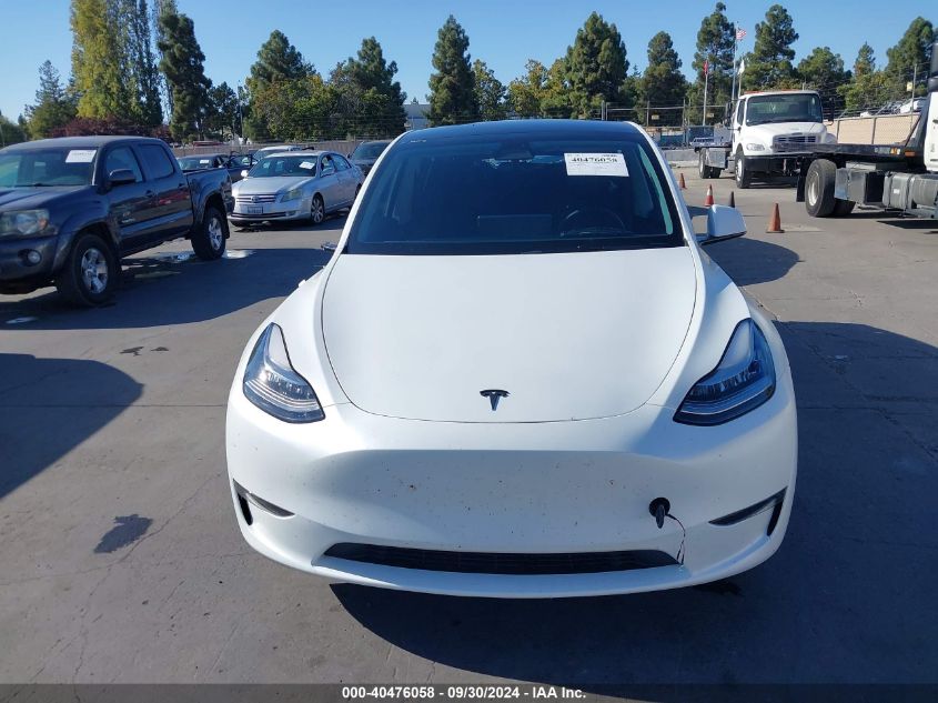 2023 Tesla Model Y Awd/Long Range Dual Motor All-Wheel Drive VIN: 7SAYGDEE2PA071528 Lot: 40476058