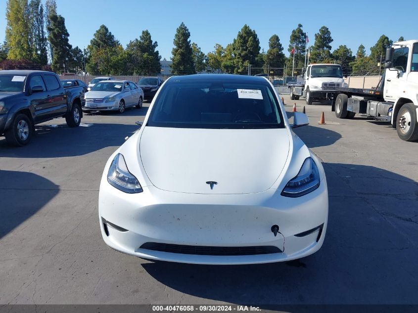 2023 Tesla Model Y Awd/Long Range Dual Motor All-Wheel Drive VIN: 7SAYGDEE2PA071528 Lot: 40476058