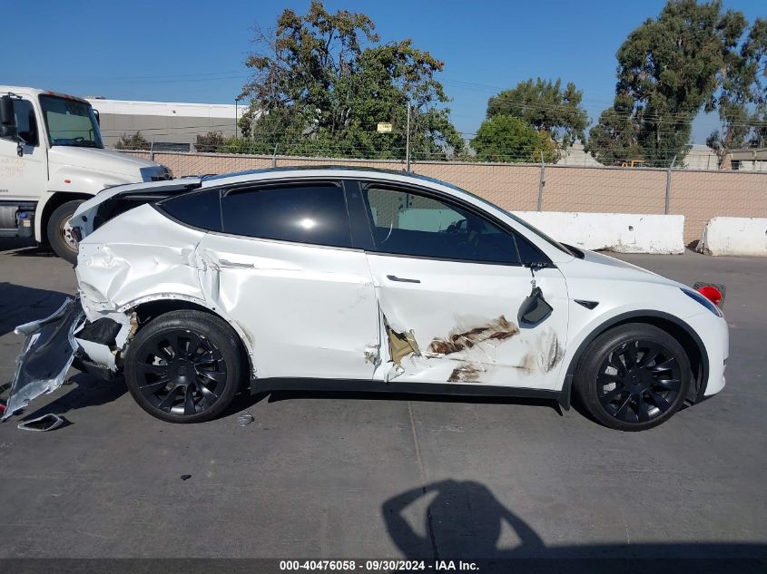 2023 Tesla Model Y Awd/Long Range Dual Motor All-Wheel Drive VIN: 7SAYGDEE2PA071528 Lot: 40476058