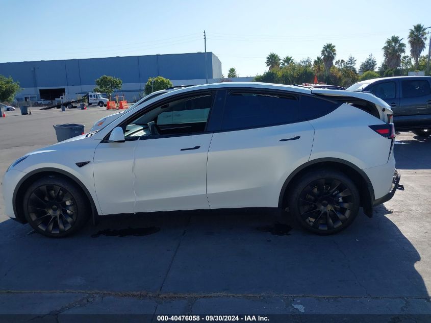 2023 Tesla Model Y Awd/Long Range Dual Motor All-Wheel Drive VIN: 7SAYGDEE2PA071528 Lot: 40476058