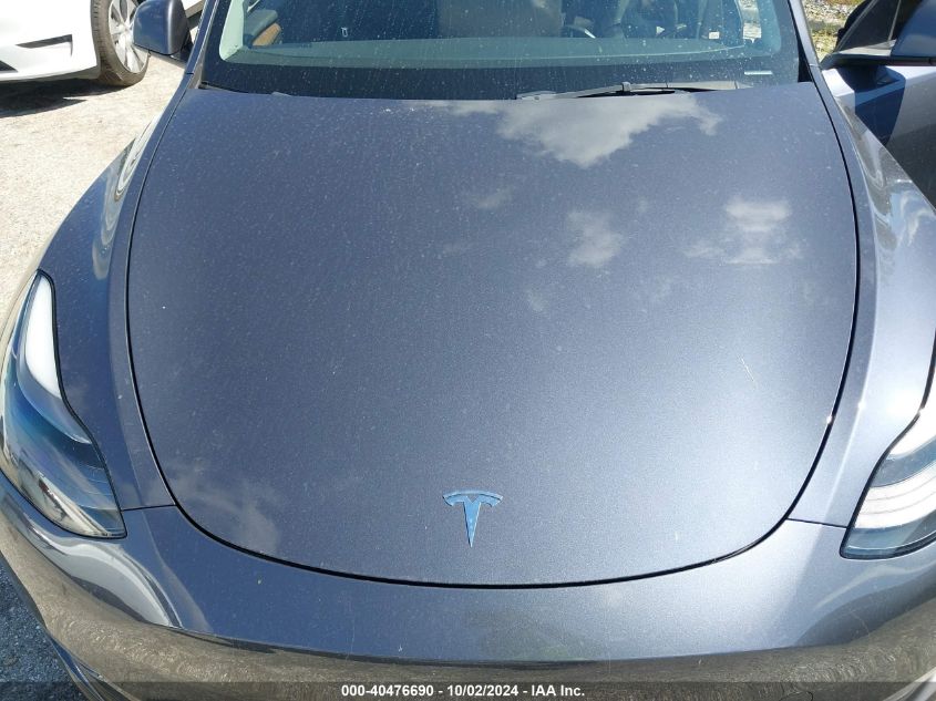 2023 Tesla Model Y VIN: 7SAYGDEF0PF598320 Lot: 40476690