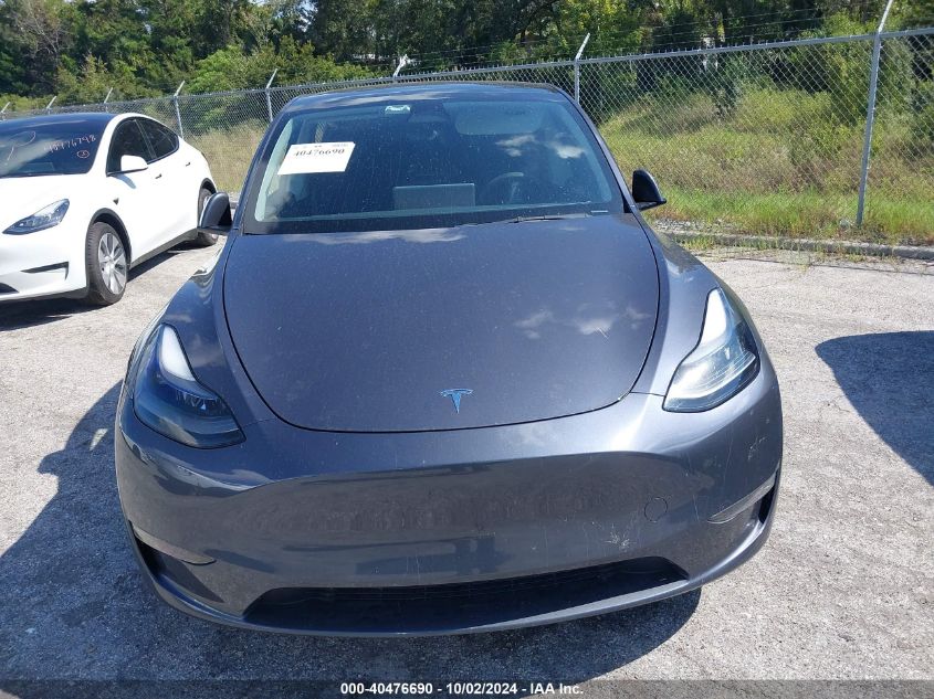 2023 Tesla Model Y VIN: 7SAYGDEF0PF598320 Lot: 40476690