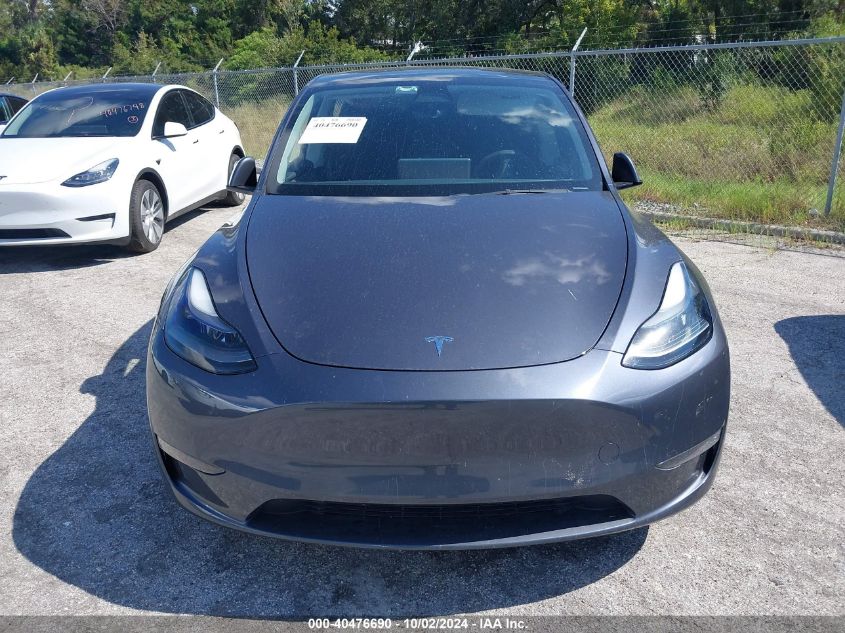 2023 Tesla Model Y VIN: 7SAYGDEF0PF598320 Lot: 40476690