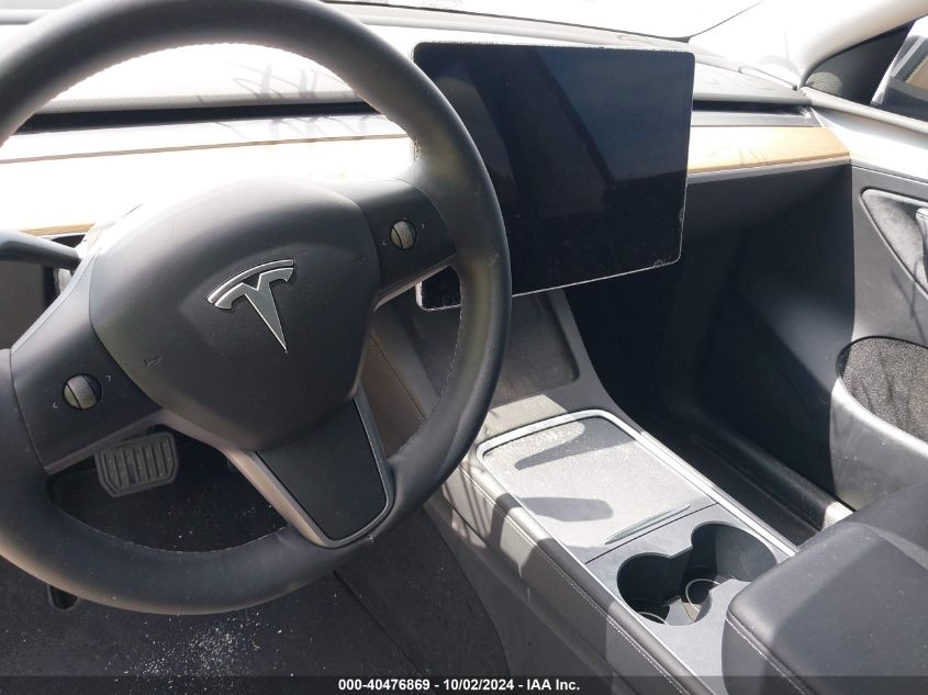 2023 Tesla Model Y Awd/Long Range Dual Motor All-Wheel Drive VIN: 7SAYGDEE7PA069418 Lot: 40476869