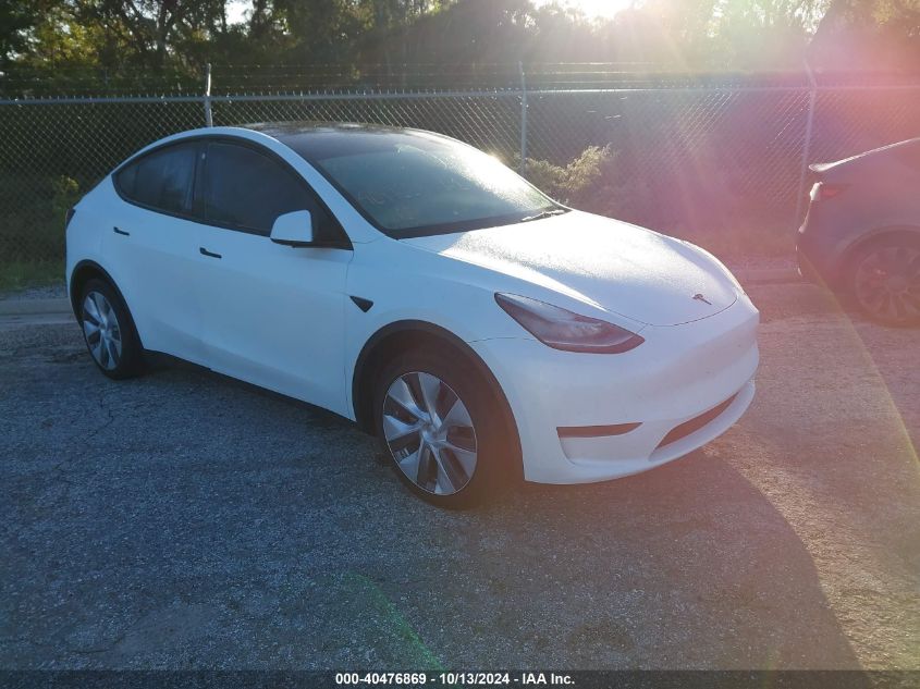 VIN 7SAYGDEE7PA069418 2023 Tesla Model Y, Awd/Long... no.4