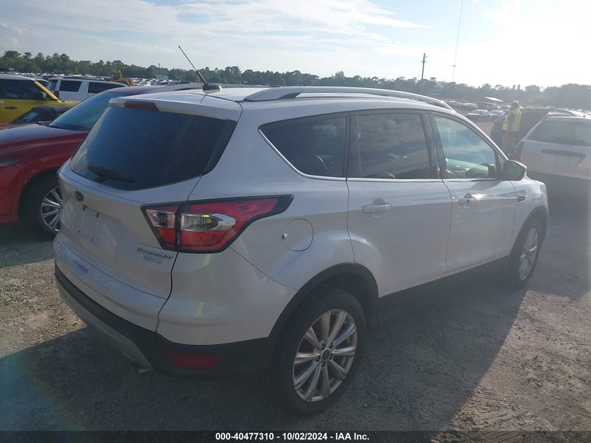VIN 1FMCU0JD4HUB06065 2017 FORD ESCAPE TITANIUM