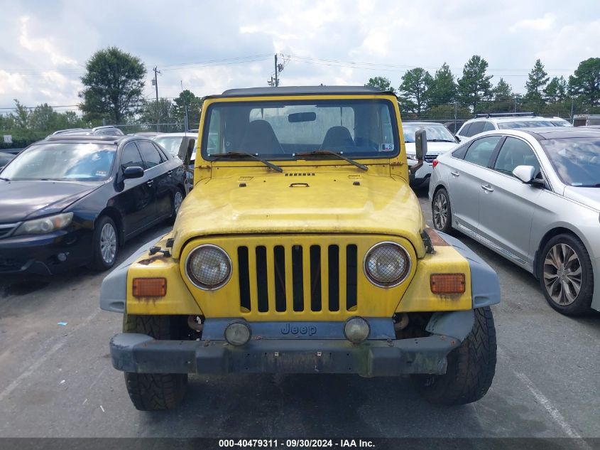 2000 Jeep Wrangler Sport VIN: 1J4FA49S3YP748063 Lot: 40479311