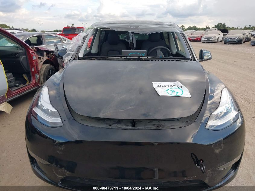 2023 Tesla Model Y Awd/Long Range Dual Motor All-Wheel Drive VIN: 7SAYGDEE9PA135435 Lot: 40479711