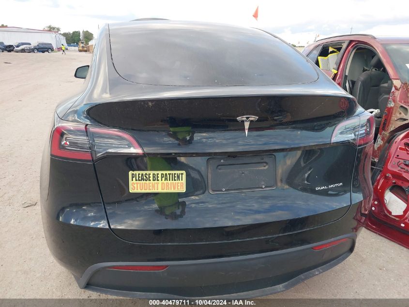 2023 Tesla Model Y Awd/Long Range Dual Motor All-Wheel Drive VIN: 7SAYGDEE9PA135435 Lot: 40479711