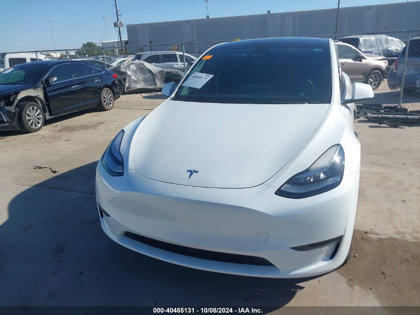 2023 Tesla Model Y Awd/Long Range Dual Motor All-Wheel Drive VIN: 7SAYGDEE0PA030461 Lot: 40485131