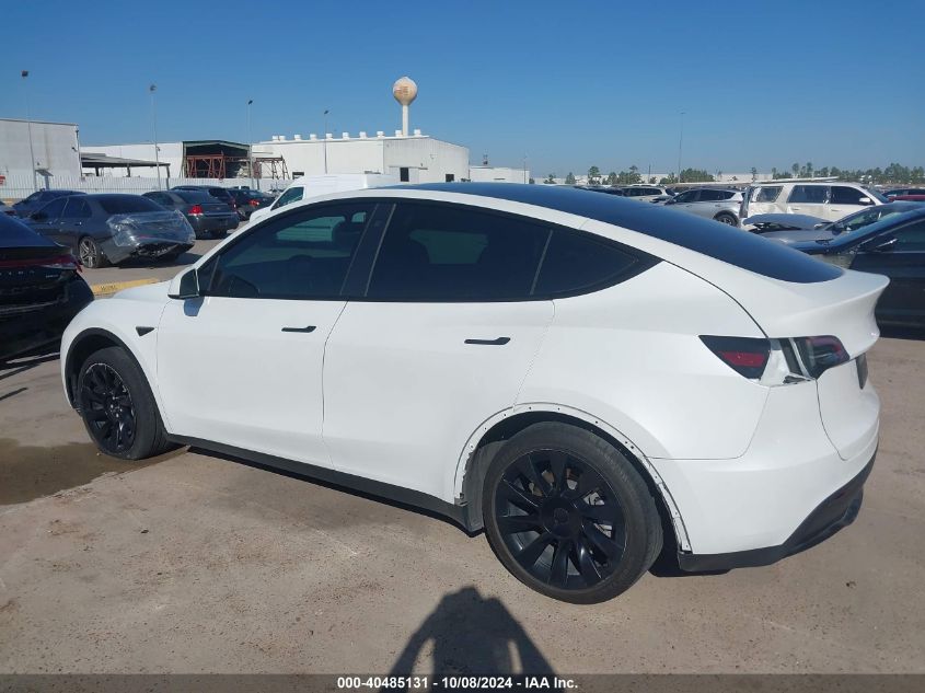 2023 Tesla Model Y Awd/Long Range Dual Motor All-Wheel Drive VIN: 7SAYGDEE0PA030461 Lot: 40485131