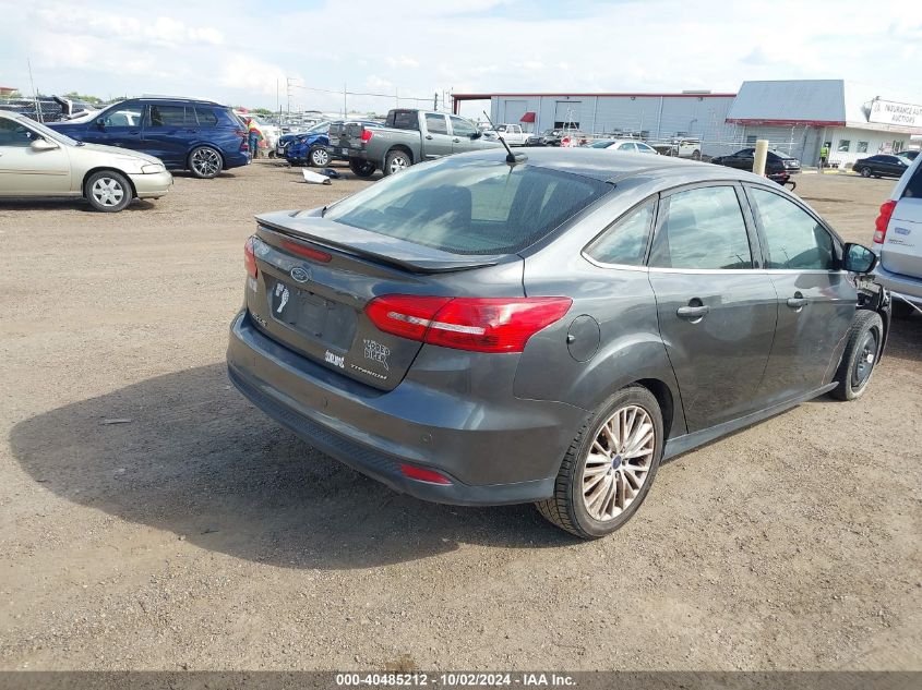 VIN 1FADP3J27HL238636 2017 Ford Focus, Titanium no.4