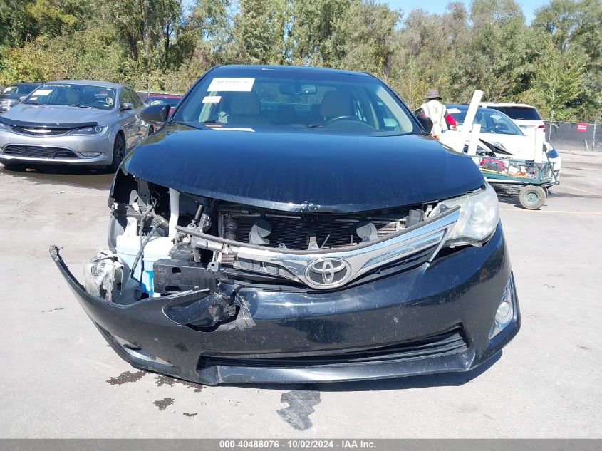 4T1BF1FK9DU702057 2013 Toyota Camry Xle