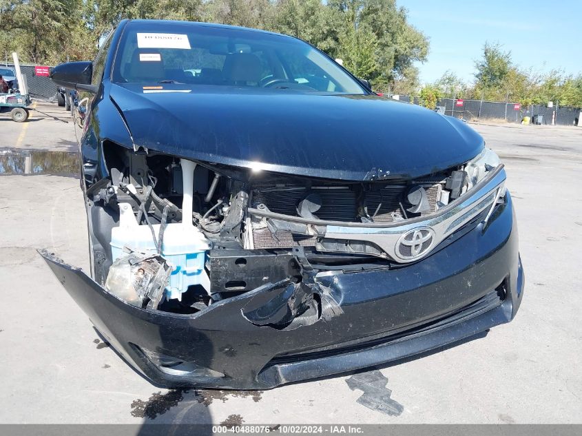 4T1BF1FK9DU702057 2013 Toyota Camry Xle