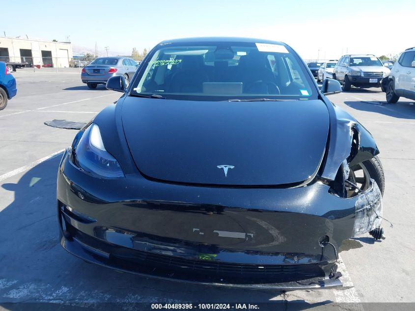 2022 Tesla Model 3 Long Range Dual Motor All-Wheel Drive VIN: 5YJ3E1EB4NF189789 Lot: 40489395