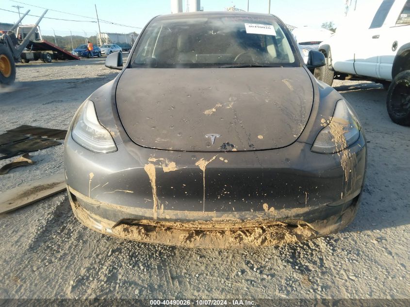 2023 Tesla Model Y Awd/Long Range Dual Motor All-Wheel Drive VIN: 7SAYGDEE9PA052474 Lot: 40490026