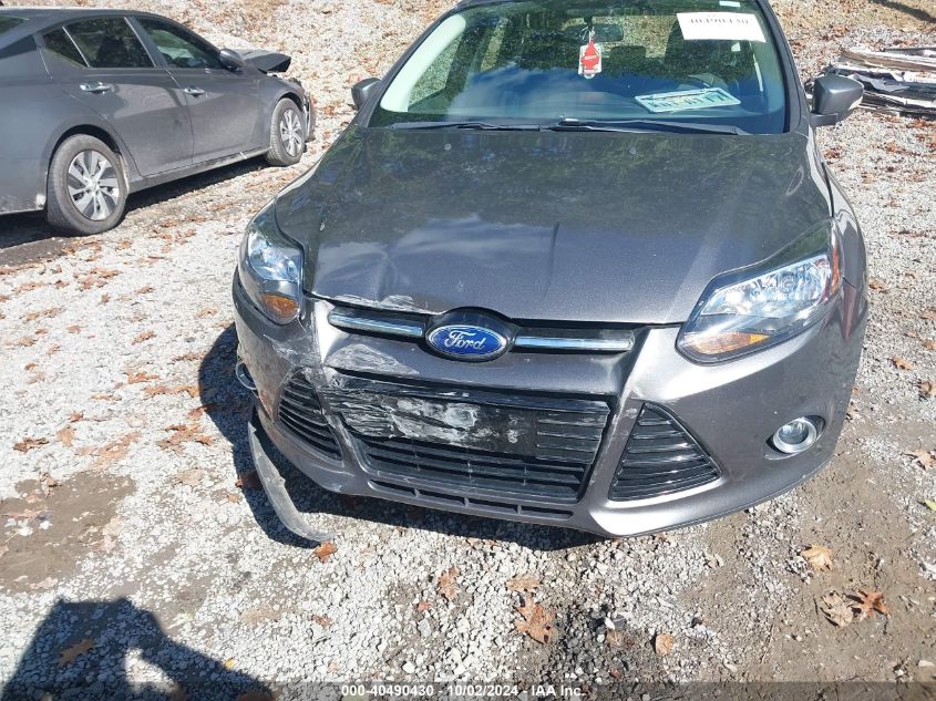 2014 Ford Focus Titanium VIN: 1FADP3N25EL292748 Lot: 40490430