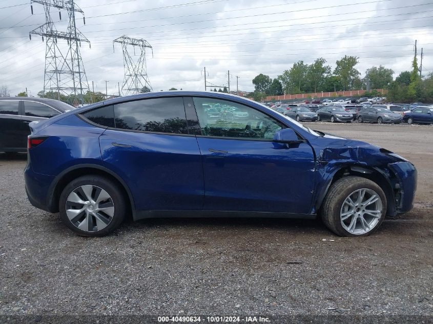 2023 Tesla Model Y Awd/Long Range Dual Motor All-Wheel Drive VIN: 7SAYGDEE9PF685253 Lot: 40490634