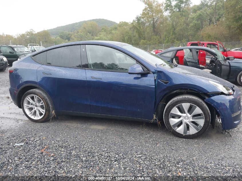 2023 Tesla Model Y Awd/Long Range Dual Motor All-Wheel Drive VIN: 7SAYGDEE1PA044790 Lot: 40491127