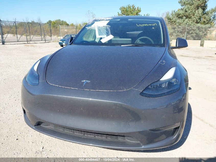 2023 Tesla Model Y Awd/Long Range Dual Motor All-Wheel Drive VIN: 7SAYGDEE3PF700801 Lot: 40494407