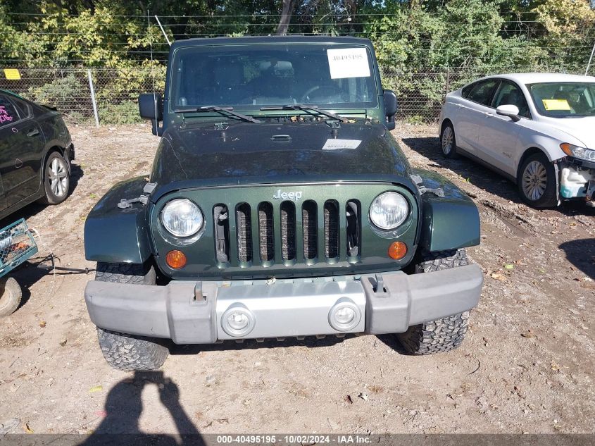 2010 Jeep Wrangler Unlimited Sahara VIN: 1J4BA5H15AL127143 Lot: 40495195