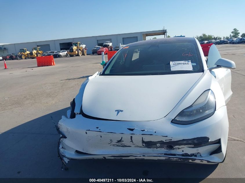 5YJ3E1EA4JF027291 2018 Tesla Model 3 Long Range/Mid Range